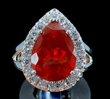 3.19 ct gem quality red fire opal & diamond halo ring in platinum, with GIA lab report