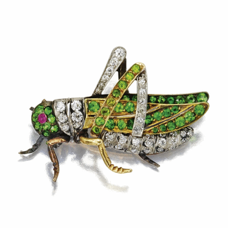 Beautiful bee brooch set with garnets and diamonds.