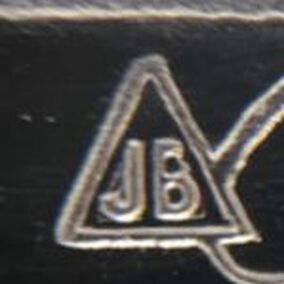 Hallmark of vintage watch bracelet manufacturer, Jacoby-Bender (JB inside triangle)