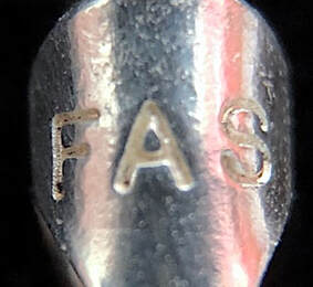Jewelry trademark of Designs by FMC (FAS)