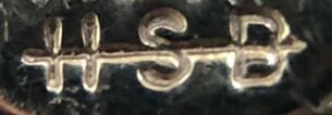 Jewelry hallmark of Harry S. Bick (HSB with a line thru it)