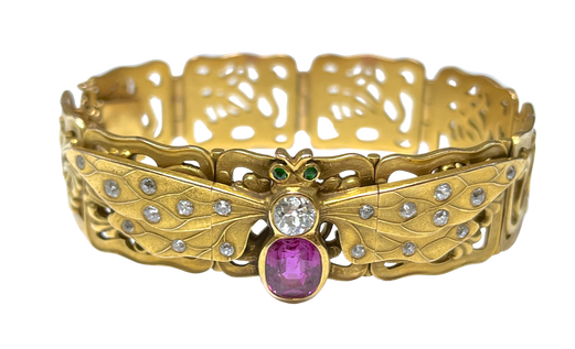 Magnificent Art Nouveau Era dragonfly bracelet, by Bailey, Banks, and Biddle, set with a fancy sapphire, tsavorite garnets, and old mine cut diamonds in 14K gold