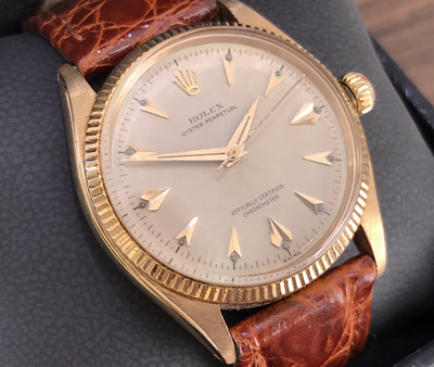 Rolex Oyster Perpetual, circa 1956, in a solid 18K rose gold case